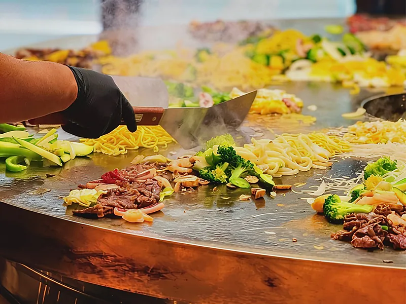 Sizzling Mongolian teppanyaki with fresh meat, veggies and noodles at Hungry Bowl Mongolian Grill, Sushi & KBBQ, an Asian Restaurant in Leominster
